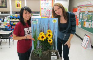 Katherine and Danielle with a habitat display